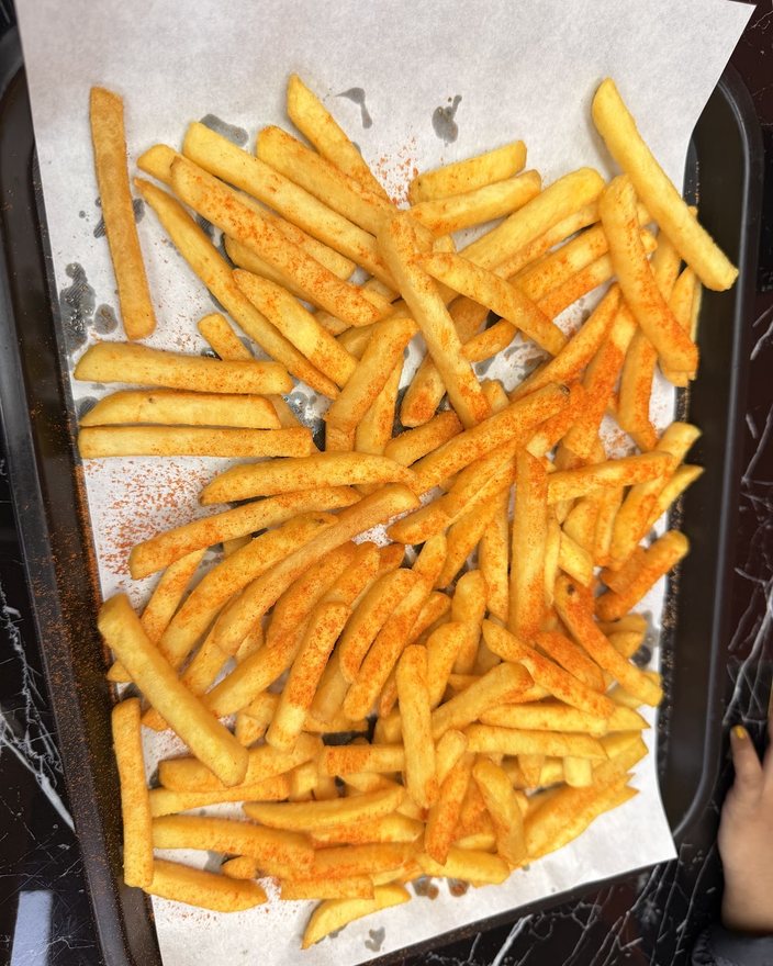 A tray of seasoned fries