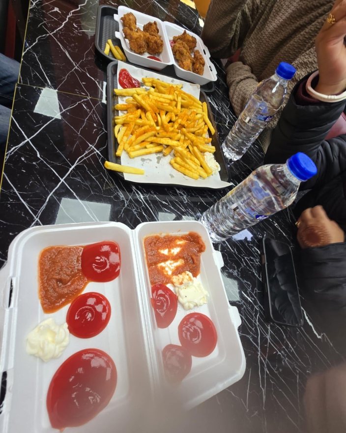 Wings and fries on the table at Dalston Doner & Grill